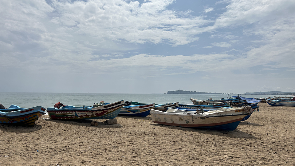 Colorful fishing boats resting on a beach