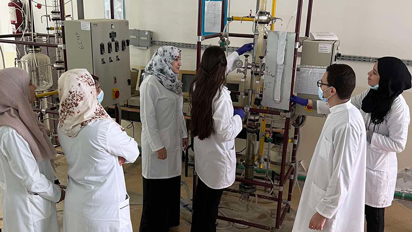 Teacher and students in a lab at University Constantine 3 Salah Boubnider 3