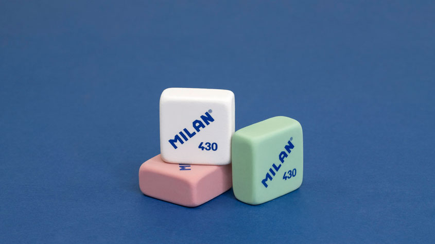 Photo of MILAN 430 erasers on a blue background