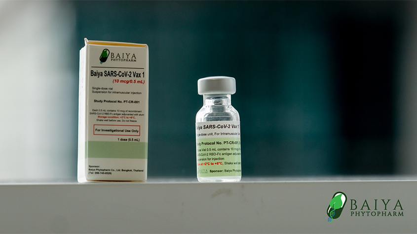 A bottle of Baiya Phytopharm experimental Sars-Cov-2 vaccine with the vaccine packaging