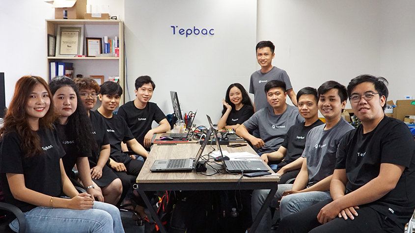 The Tepbac Team, a group of 11 young men and women with Tepbac black or grey tee-shirts