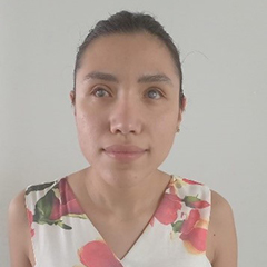 Rosalía posing for a photo with a dress.