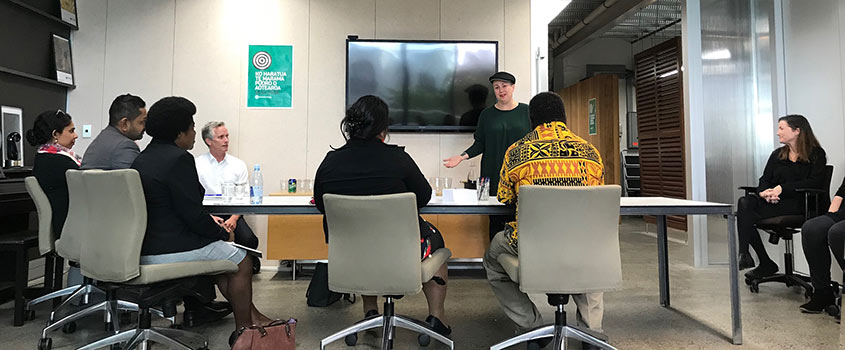 Participants meeting with officials from the NZ Division of APRA AMCOS during the workshop.