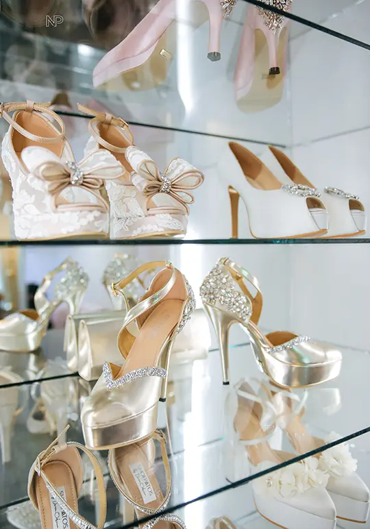 A collection of Doreen Odvina party shoes on a rack