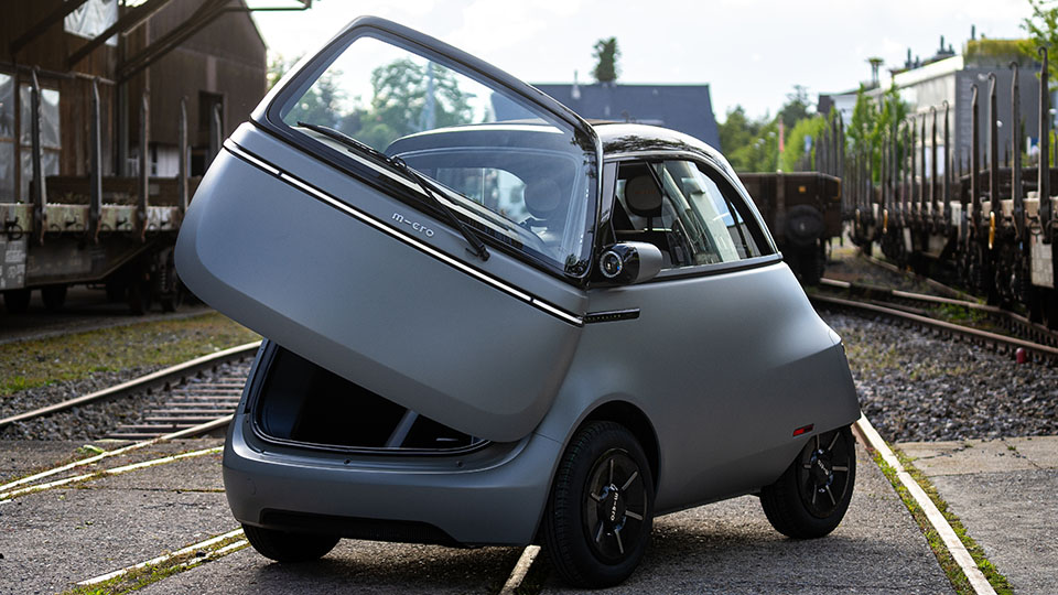Microlino Electric Bubble car with its door opened