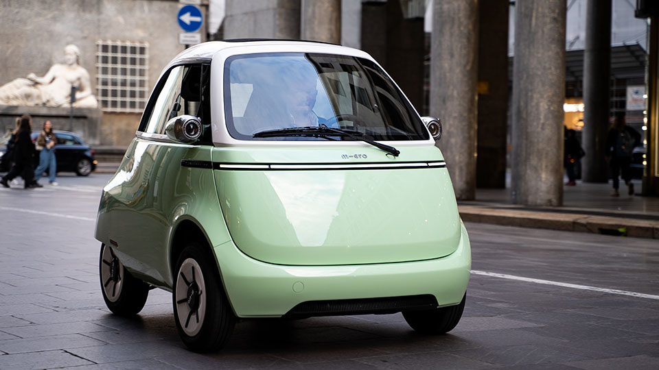 Green Microlino Electric Bubble car