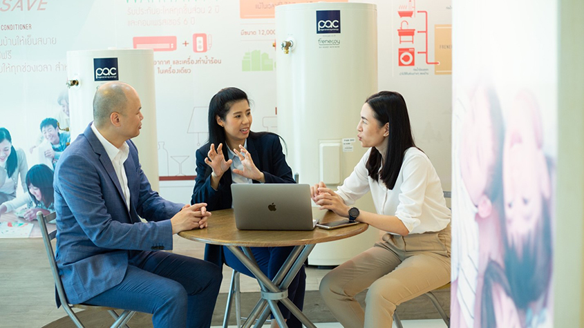 Apichat (left) and Atchara Poomee (middle) the two co-founders of PAC Corp, in discussion with an officer from the Department of Intellectual Property of Thailand