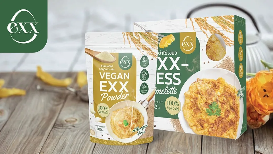 A bag of exx plant-based egg replacement powder in front of a box of plant-based egg replacement omelet mix