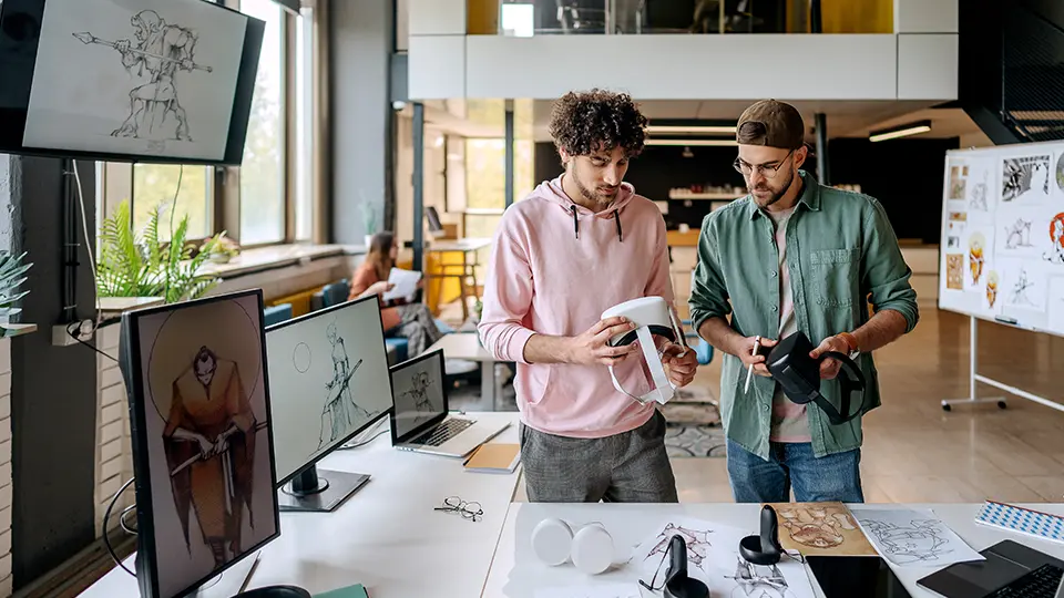 Virtual reality game designers in the office