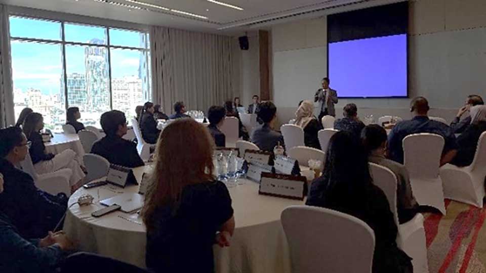 Trainer presenting to participants seated at round tables during the WIPO-ASEAN IP and Market Strategy Training workshop