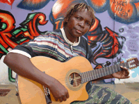 Olith Ratego - sweet sounds and sharp social comment. His interest in music came from his mother, a singer of "dodo" traditional Luo music. (Courtesy of Ketebul music)