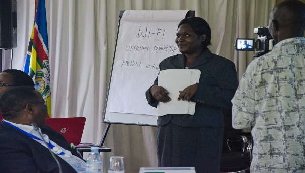 Ms. Beatrice Guzu, Chief Executive Officer, Uganda Disability Council, giving her presentation with notes in Braille, an accessible format. (Photo: WIPO)