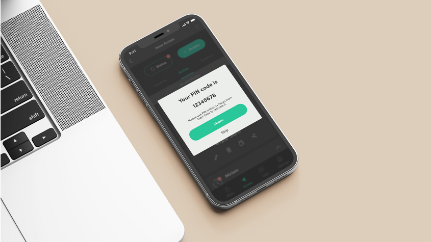 Photo of a smartphone with screen showing a page of the igloohome app