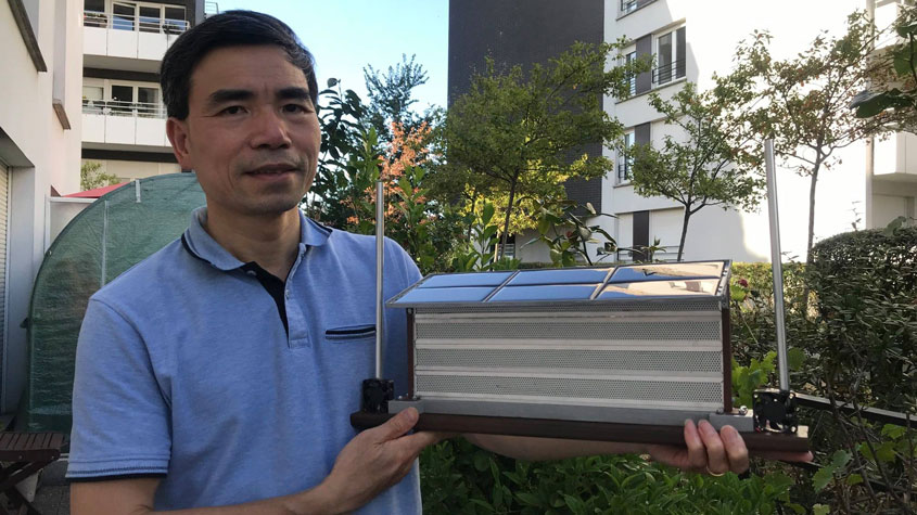 Photo, Tuan Nghiem VU, President of TechSafe, shares a model of TechSafe Industries' SunScreen
