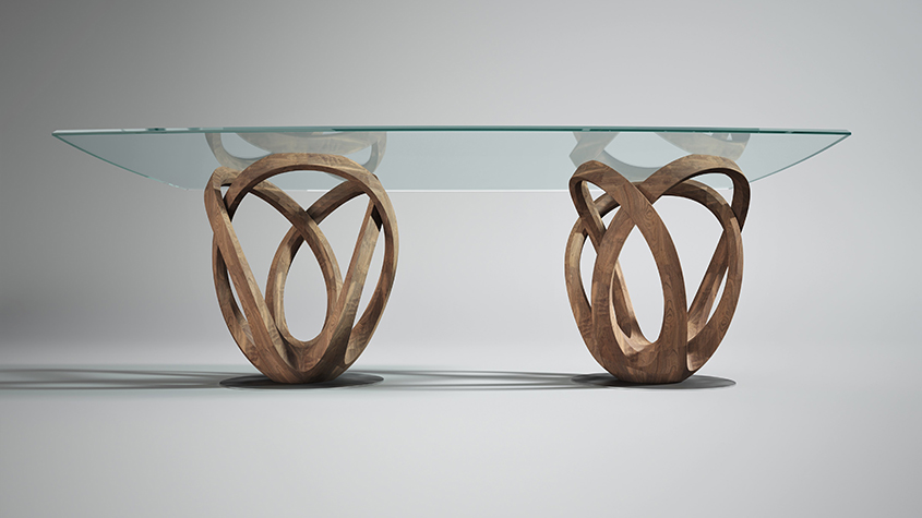 One of Nastaran’s creations, a table with a glass top and intertwined wood legs