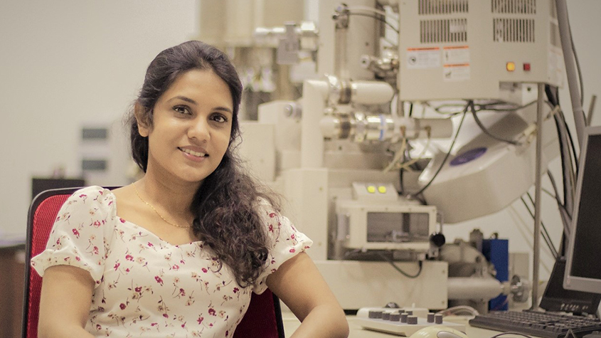 Haily Seneviratne, co-inventor of Fortigrains Lanka fortified rice, sitting in a chair in front of laboratory equipment