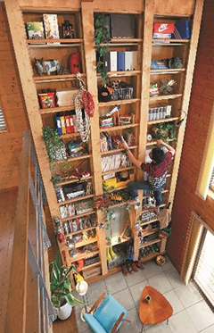 Wooden bookshelf with built-in ladder