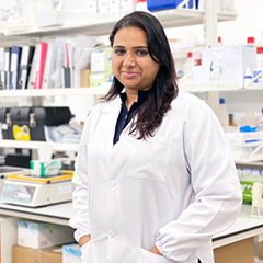 Shiok Meats co-founder and CEO, Dr. Sandhya Sriram, in a while lab coat