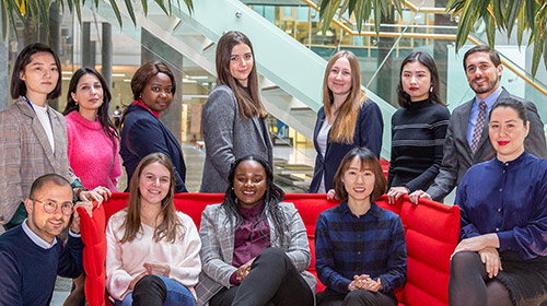 Group of WIPO interns in a common space