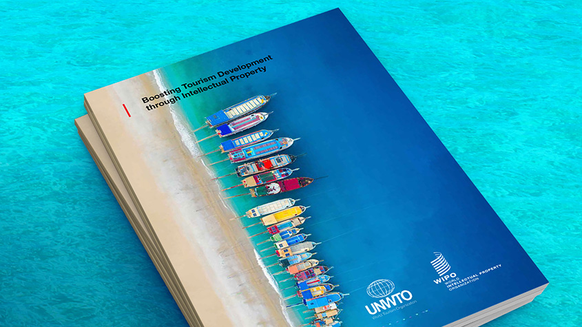 image d’une publication d’un fond de mer avec une couverture de bord de mer et des bateaux exotiques, symbolisant le secteur du tourisme