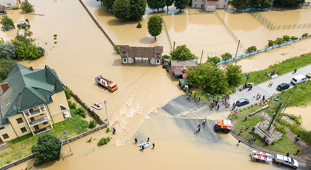 Aerial view of flooded houses and rescue vehicles saving people in Halych town, western Ukraine.