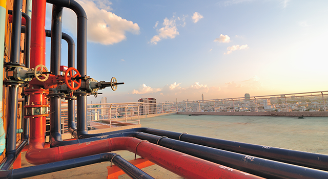 Pipelines on roof top of urban factory