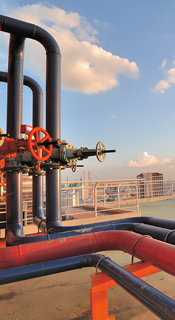 Pipelines on roof top of urban factory