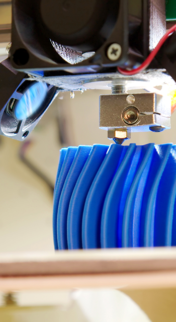 Close up shot of a 3D printer.