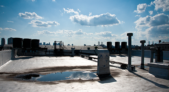 Brooklyn Rooftop with Manhattan Skyline as Background in sunny afternoon