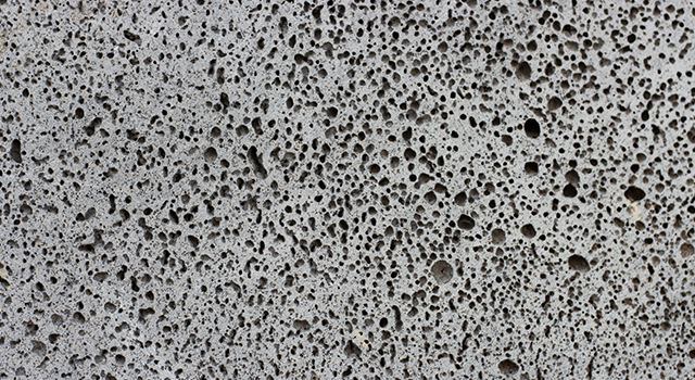 dark gray porous concrete close-up, texture, background