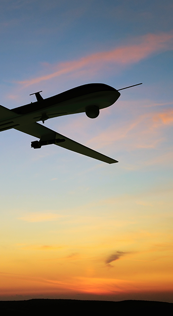 Unmanned Aerial Vehicle (UAV), also known as Unmanned Aircraft System (UAS). Digitally Generated Image isolated on white background