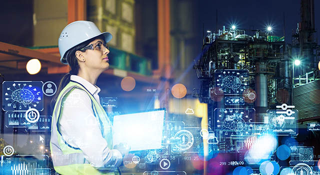 Industrial technology concept. Female engineer working in the factory. Digital transformation.