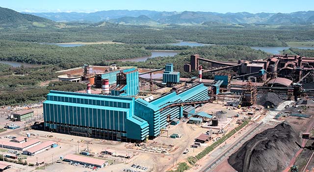 Aerial view of iron ore processing plant in final phase of construction and assembly work, on the coast of Espírito Santo, near the port of export of finished products.
