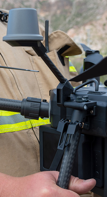 firefighter operating drone in search and rescue
