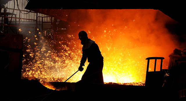 The worker in front of the blast furnace,