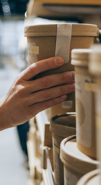 An unrecognizable female customer choosing things she wants to buy.