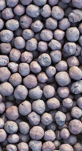 Seamless abstract background of expanded clay or balls of iron ore.