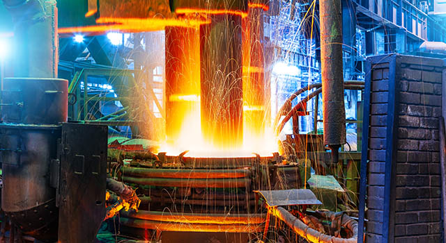 Working electroarc furnace at the metallurgical plant workshop
