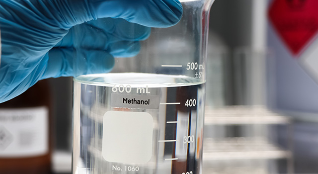 Methanol in glass,Hazardous chemicals and symbols on containers in industry or laboratory