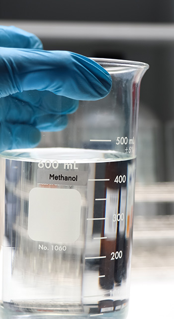 Methanol in glass,Hazardous chemicals and symbols on containers in industry or laboratory