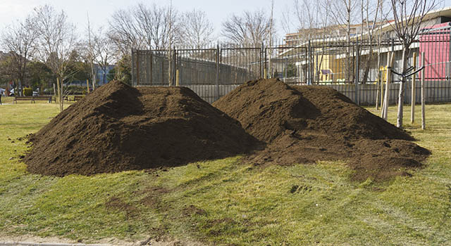 Mountain of compost for plants in a park