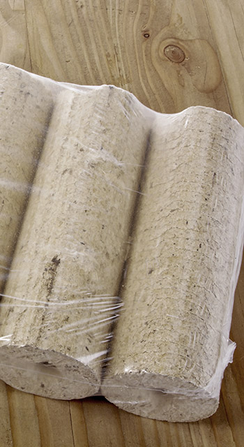 A pack of wooden briquettes on a table