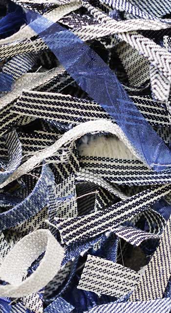 Scraps of cut fabric. Close-up of fabric parts. recycle fabric.