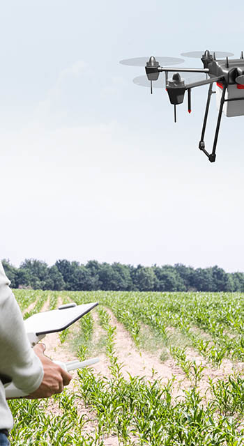 Man Operating The Quadrocopter In The Park